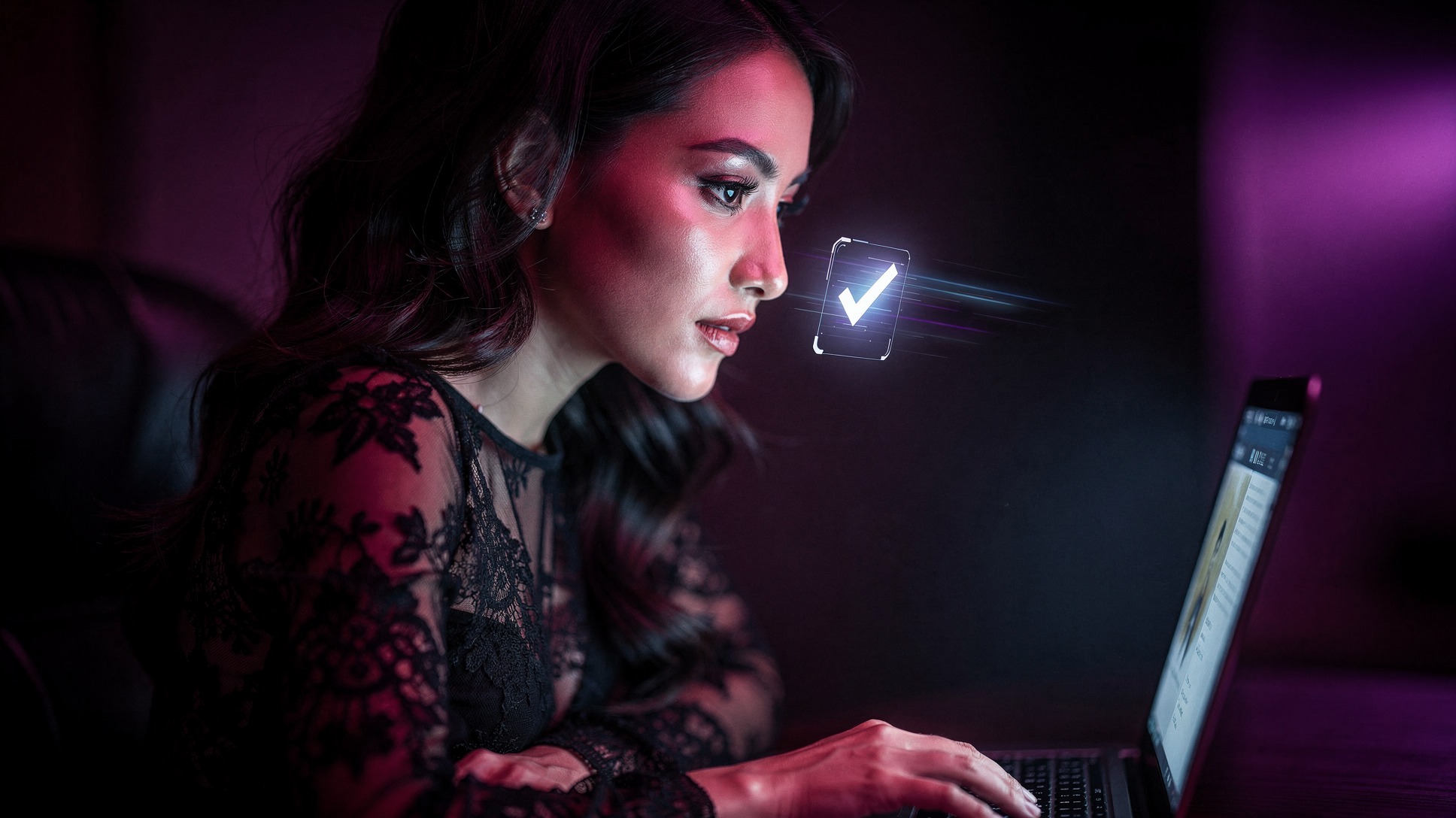 Woman's profile illuminated by screen glow with verified checkmark